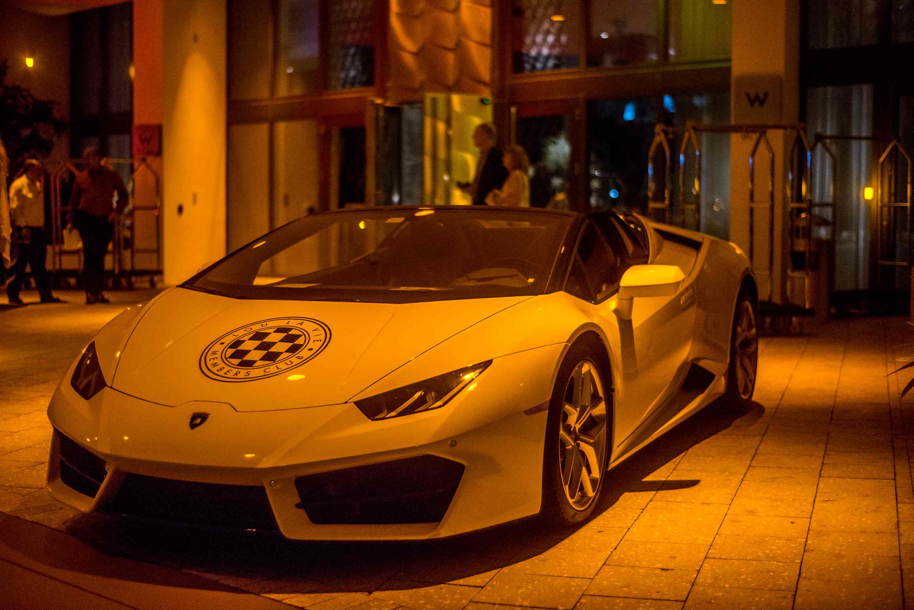 Lou La Vie Ferrari on display outside The W